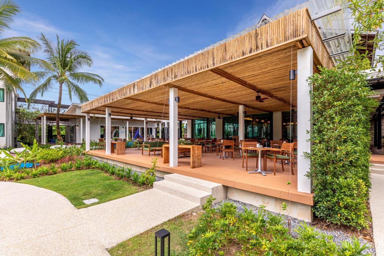 Outrigger Khao Lak Beach Resort - Sha Extra Plus Exterior foto The restaurant at the resort